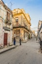 Two men chatting at streetcorner in Old Havana
