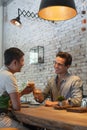 Two Men Cheers Toast Drink Ice Coffee, Asian Mix Royalty Free Stock Photo