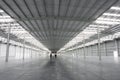 Large warehouse for industrial purposes illuminated by solar light