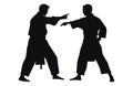Two men demonstrate karate, Men demonstrate karate, Fight between two aikido fighters vector silhouette Royalty Free Stock Photo