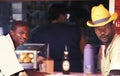 Two men drinking beer in Brazil. Royalty Free Stock Photo