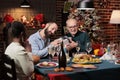 Two men exchanging gifts at christmas Royalty Free Stock Photo