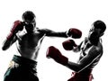 Two men exercising thai boxing silhouette Royalty Free Stock Photo