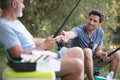 two men fishing in lake Royalty Free Stock Photo