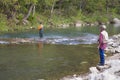 Two Men Fishing for Rainbow Trout Royalty Free Stock Photo