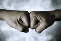 Two men fist bumping Royalty Free Stock Photo