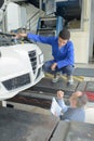 Two man fixing car problem Royalty Free Stock Photo