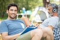 two men in front tent Royalty Free Stock Photo