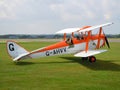 Two men going for a flight in biplane aircraft