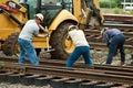 Two Men Hammering