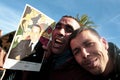 Two men holding the image of the King of Morocco Royalty Free Stock Photo