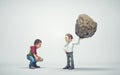 Two men lifts rocks . Skill set and experience concept Royalty Free Stock Photo
