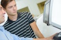 Two men looking at monitor Royalty Free Stock Photo