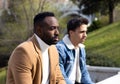 Two men looking serious and pensive. Afro-american and caucasian man Royalty Free Stock Photo