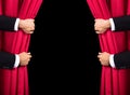 Two Men Opening Red Curtain Royalty Free Stock Photo