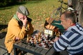 Two men play chess Royalty Free Stock Photo