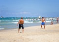 Two men play Matkot in the Israeli beach