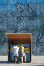 Two men playing an impro on the city-hall piano