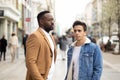 Two men posing in the Gran via Madrid Royalty Free Stock Photo