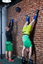 Two men are repforming handstand Royalty Free Stock Photo