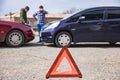 Two men reporting a car Royalty Free Stock Photo