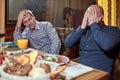 Two men in a restaurant arguing during lunch Royalty Free Stock Photo