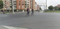 Two men riding bicycle on bicycle lane at 147th street with 9th avenue corner on bogota No car day event