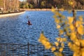 Two men are riding a kayak