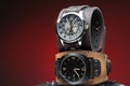 Two men's watches with wide leather bracelet
