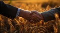 Two men shake hands in front of wheat fields. AI Generated. Royalty Free Stock Photo