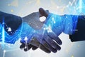 Two men shaking hands in office and chart Royalty Free Stock Photo