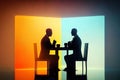 Two Men Are Sitting At A Table Having A Conversation Royalty Free Stock Photo