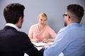 Two Men At Interview At Adoption Agency Royalty Free Stock Photo