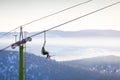 View of the ski lift and snow-capped mountains Royalty Free Stock Photo