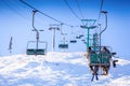 View of the ski lift and snow-capped mountains Royalty Free Stock Photo