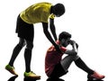 Two men soccer player fair play concept silhouette Royalty Free Stock Photo
