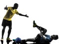 Two men soccer player standing complaining foul silhouette