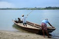 Two men sort the ferry out across the river Royalty Free Stock Photo