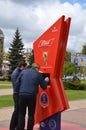 Two men are studying the time countdown to the 2018 FIFA World Cup