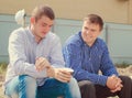 Two men taking a break for coffee Royalty Free Stock Photo