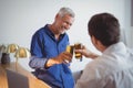 Two men toasting glasses of beer Royalty Free Stock Photo