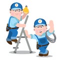 Two men in uniform working darn light. Electricians at work Royalty Free Stock Photo