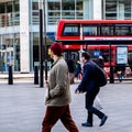 Two Men Walking Past A London Bus And A Modern Office Building In Victoria Street London Royalty Free Stock Photo