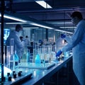 Two Men in White Lab Coats Working in a Lab Royalty Free Stock Photo