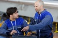 two men working at factory Royalty Free Stock Photo