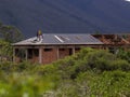 Two men working on a roof