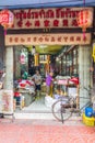 Two men working in a shop in Chinatown, Bangkok, Thailand