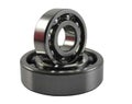 Two metal ball bearings