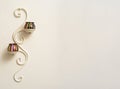 Two metal candle holder accessory on wall Royalty Free Stock Photo