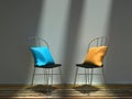 Two metal chairs with blue and yellow cushions Royalty Free Stock Photo
